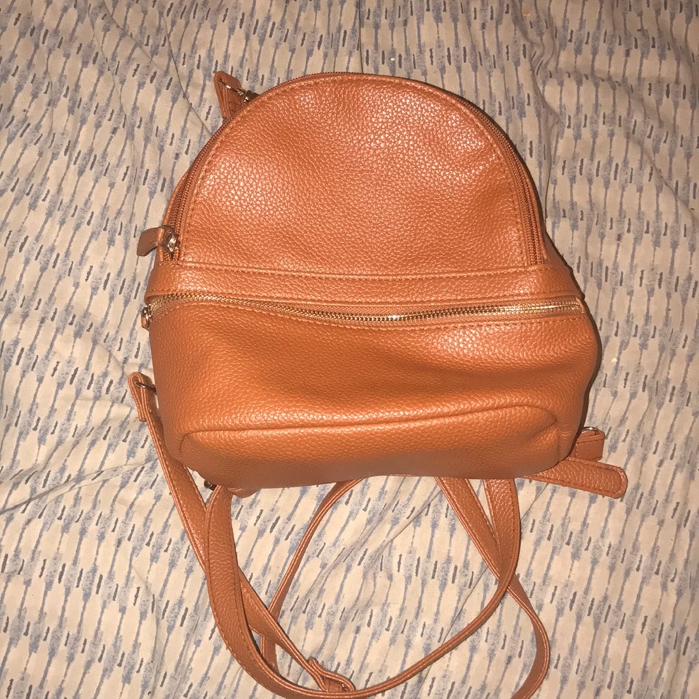 Mini faux brown leather backpack
